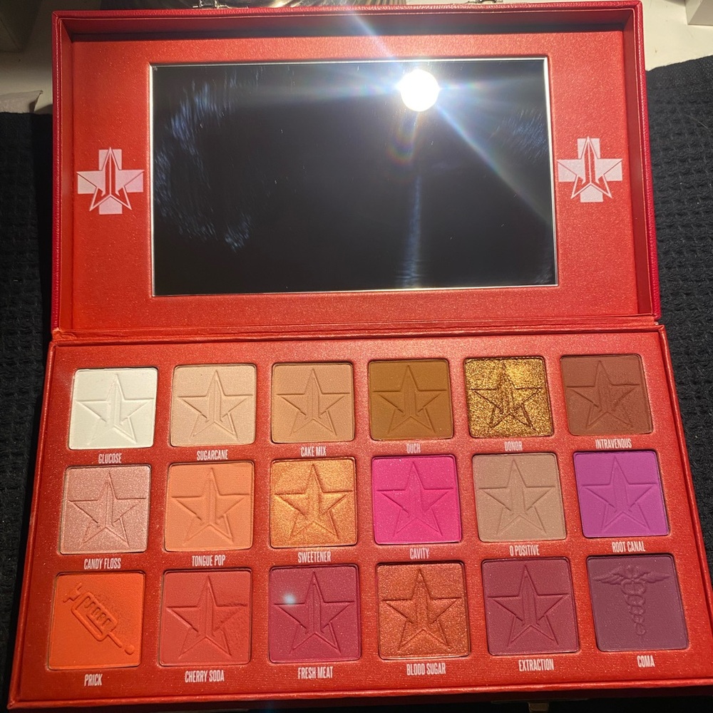 Jeffree Star Eyeshadow Palette - Red, Pink, Gold, and Purple Hues